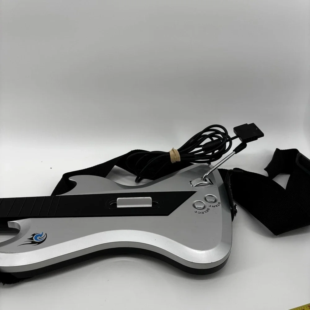 PS2 Guitar Hero React Rocker RTPS26 Silver Wired Guitar w/Strap. Untested